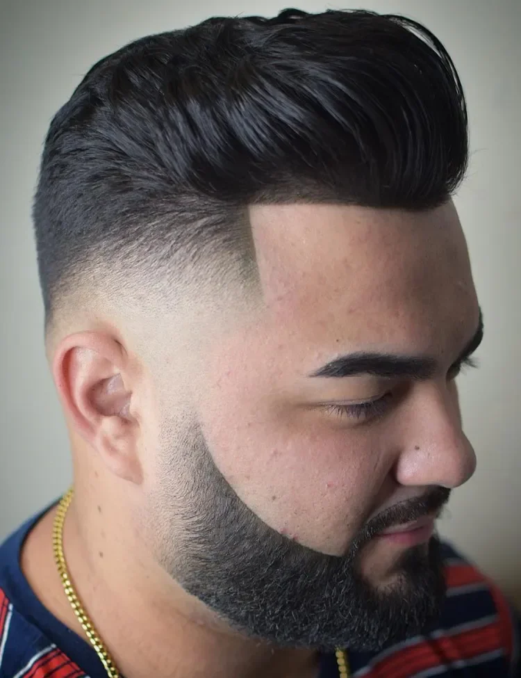 Pompadour Hairstyle with Tapered Sides for Round Face