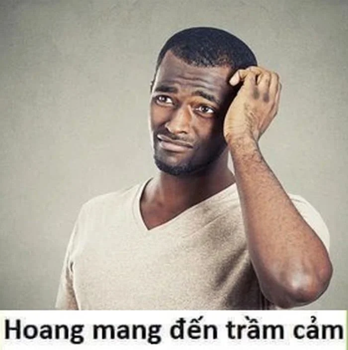 meme gãi đầu người đàn ông da màu bối rối gãi đầu với dòng chữ hoang mang đến trầm cảm